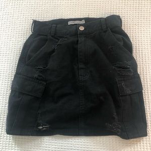 black distressed carmar skirt